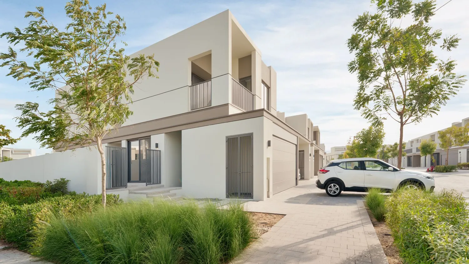 Modern villas on a landscaped street